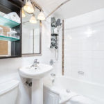 Pedestal sink and bathtub