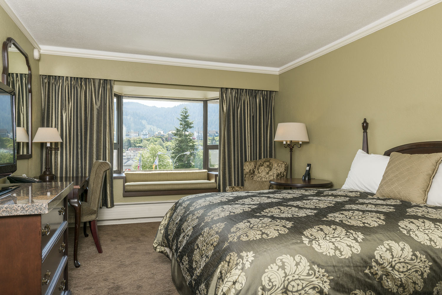 Hotel room with bed and desk