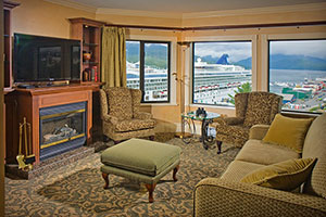 Hotel room with fireplace and tv