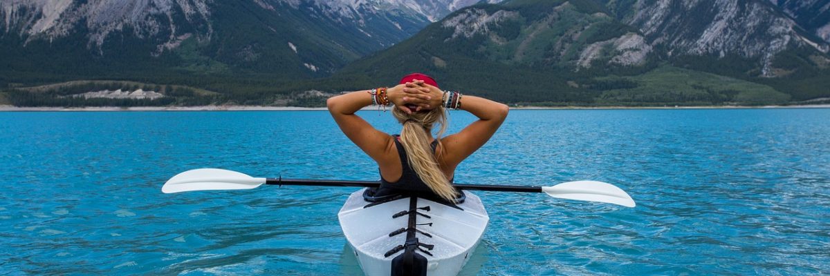 Woman relaxing in kayak