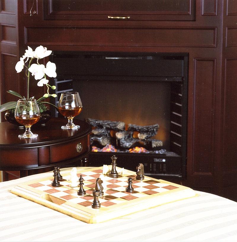 Chess table next to fireplace