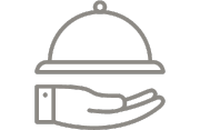 An icon of a hand holding a cloche (food cover) on a plate.