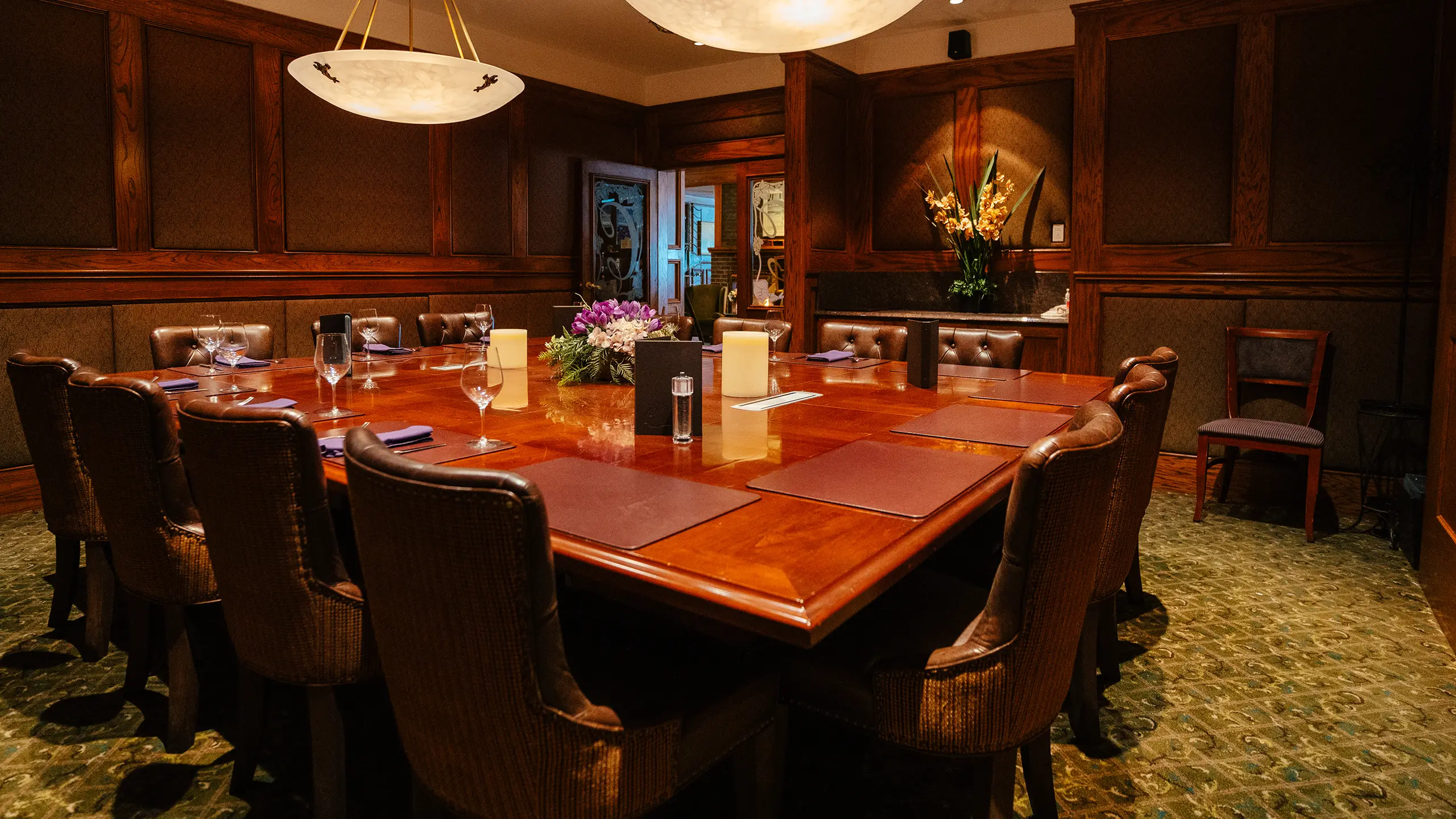 Room with beautiful square wooden table
