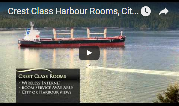 View of a large boat moving through the ocean inlet